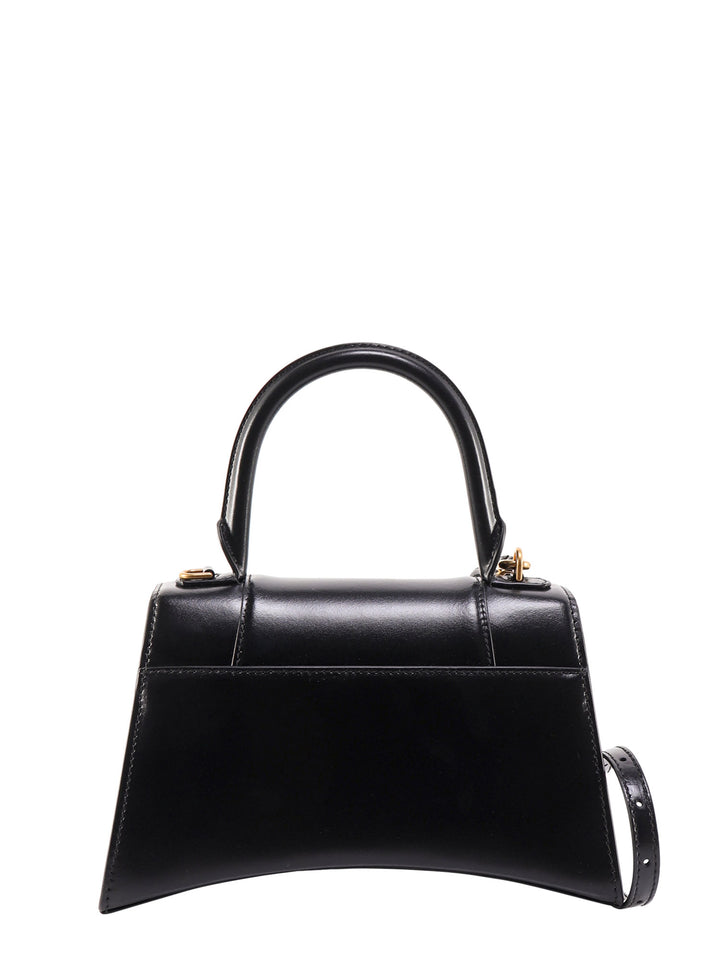 Hourglass leather handbag with iconic monogram