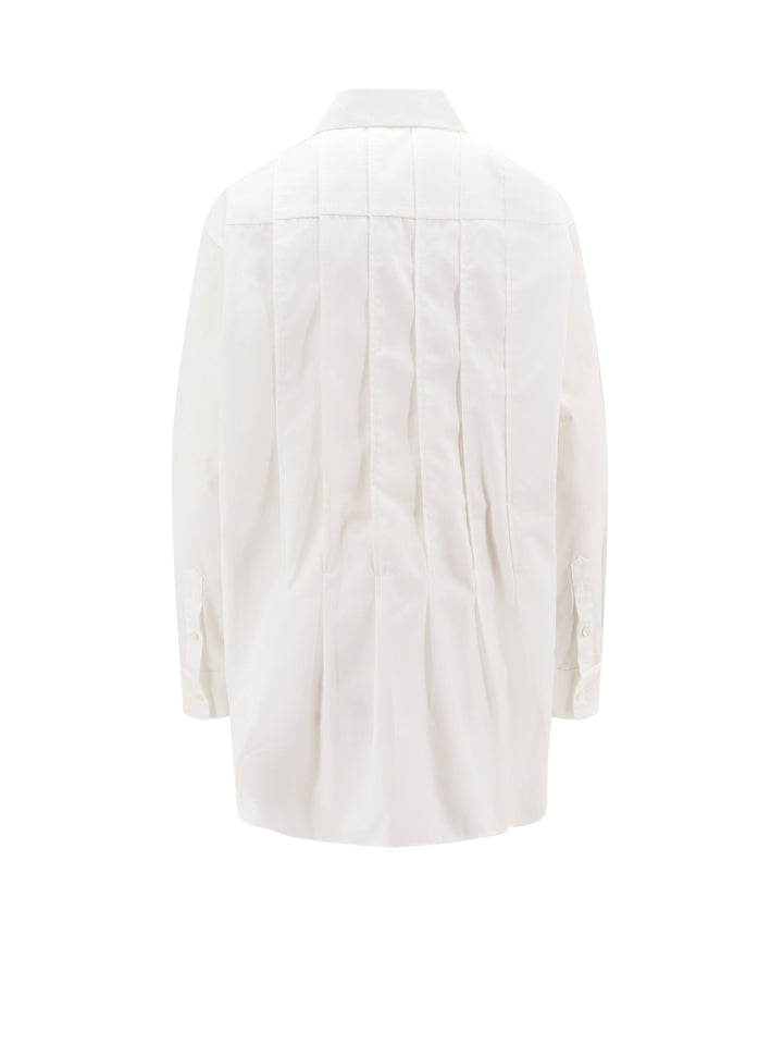 Oversize shirt with folds on the front