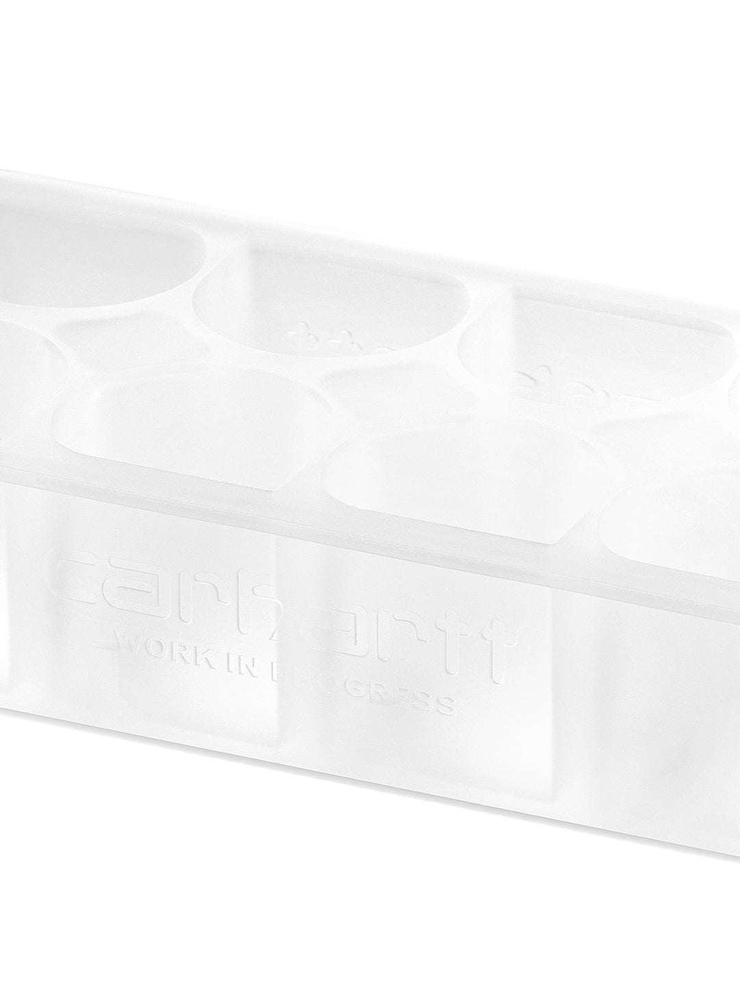 The 'C' Logo Ice Cube Tray is made from clear BPA-free silicone, featuring 'C' Logo-shaped molds. The item is dishwasher safe.