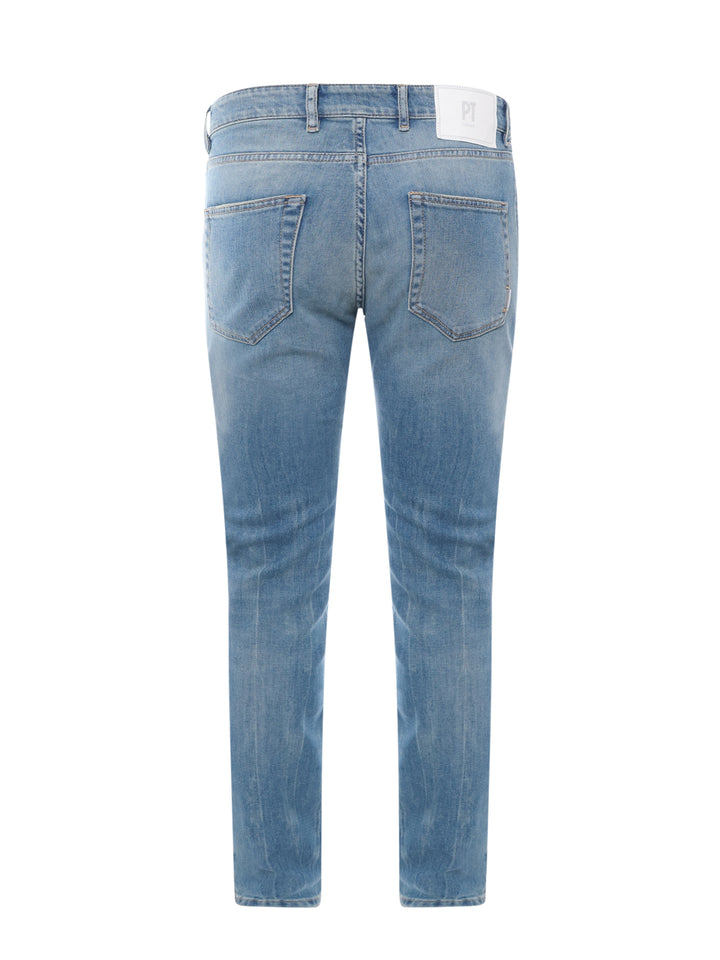 Stretch cotton jeans with back logo patch