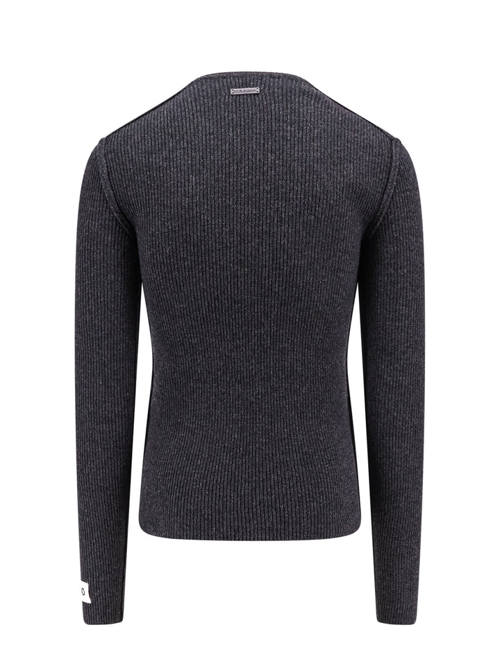 Ribbed sweater with 2009-10 label