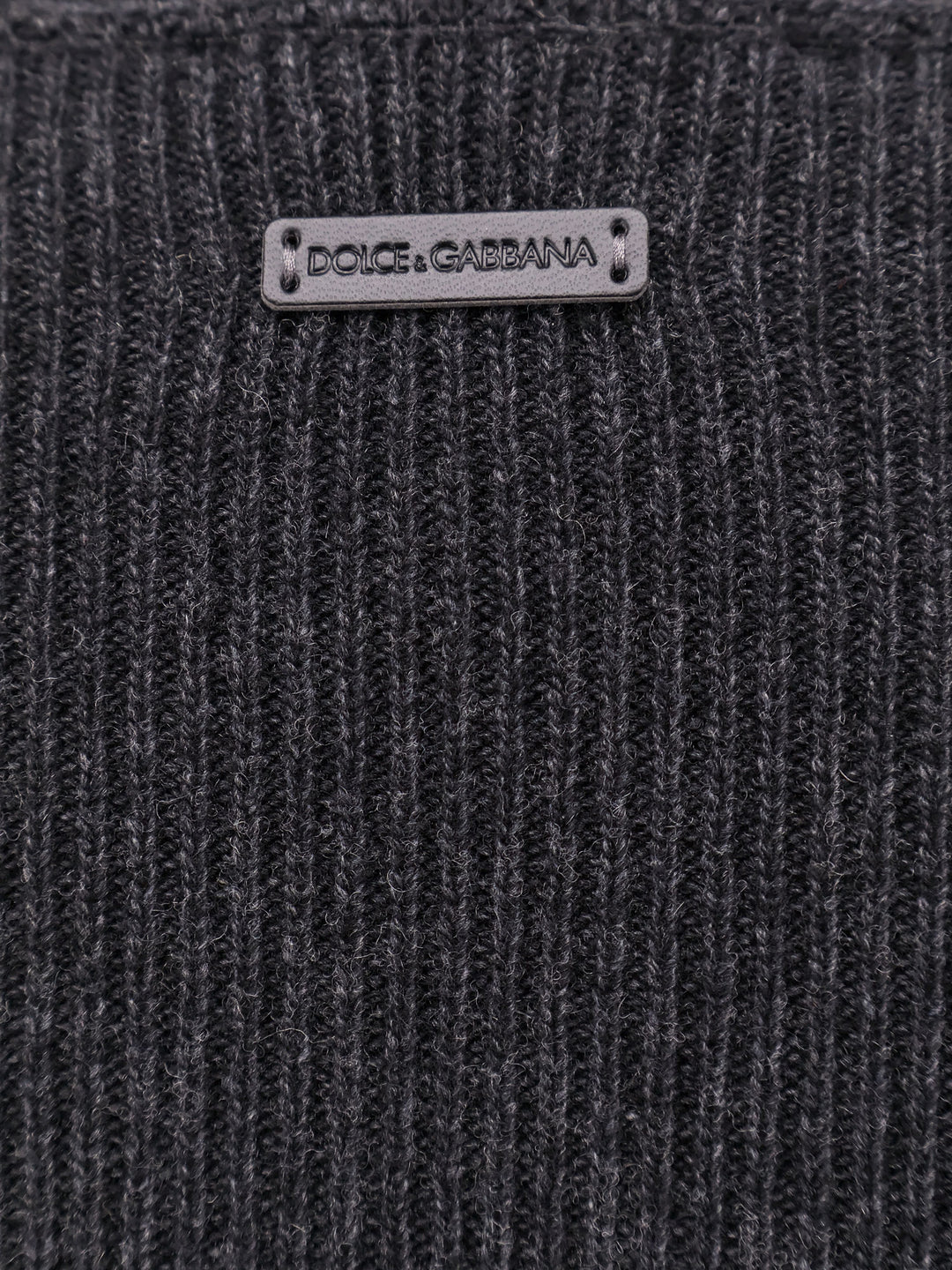 Ribbed sweater with 2009-10 label