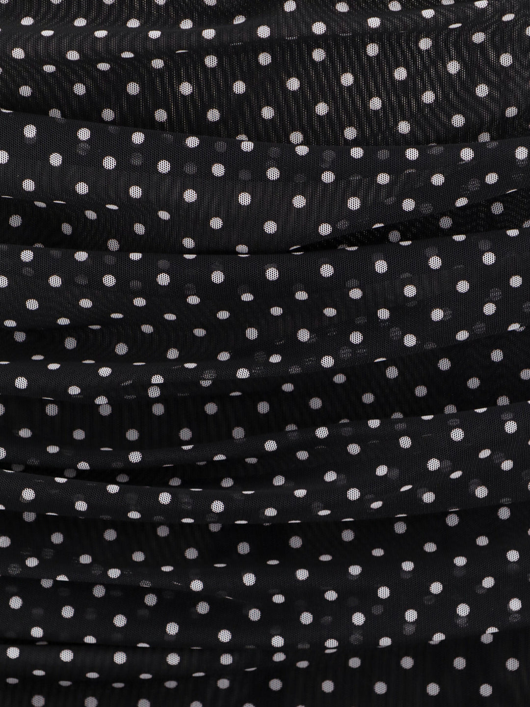 Polka-dots dress with drapery