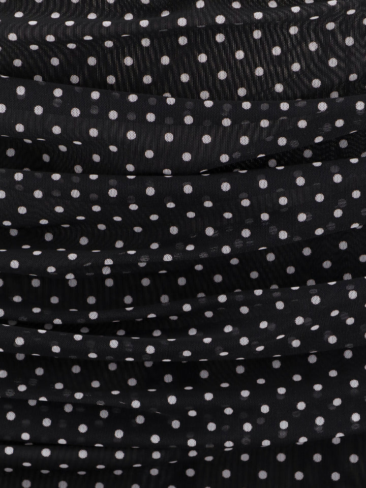 Polka-dots dress with drapery