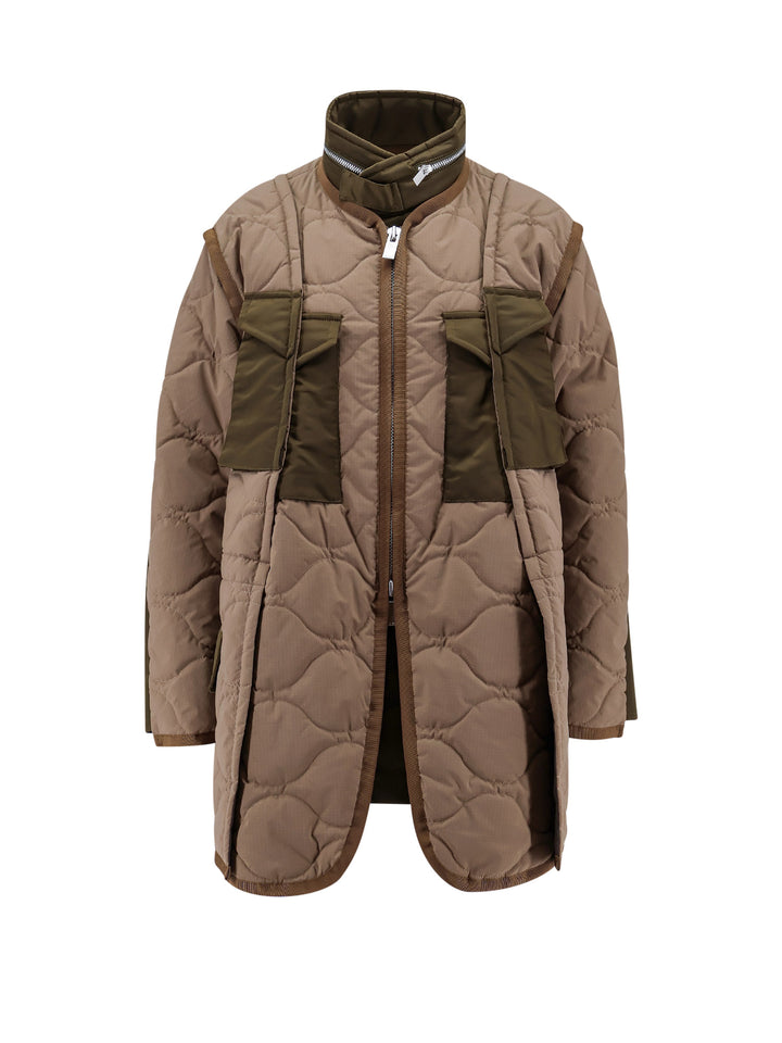 Padded and quilted jacket with nylon inserts