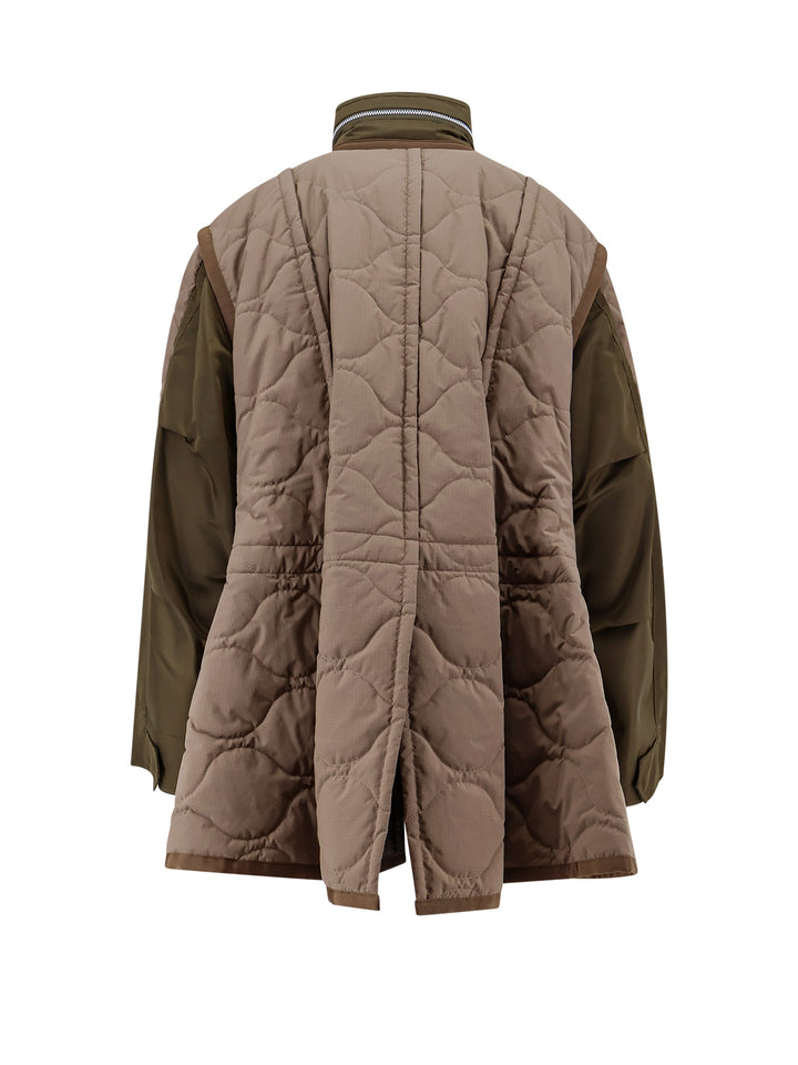 Padded and quilted jacket with nylon inserts