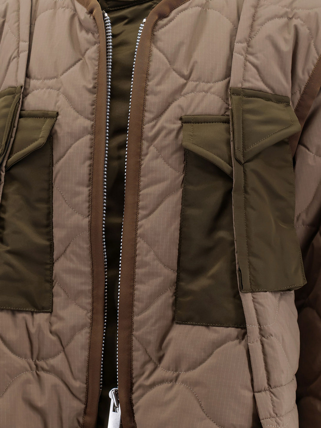 Padded and quilted jacket with nylon inserts