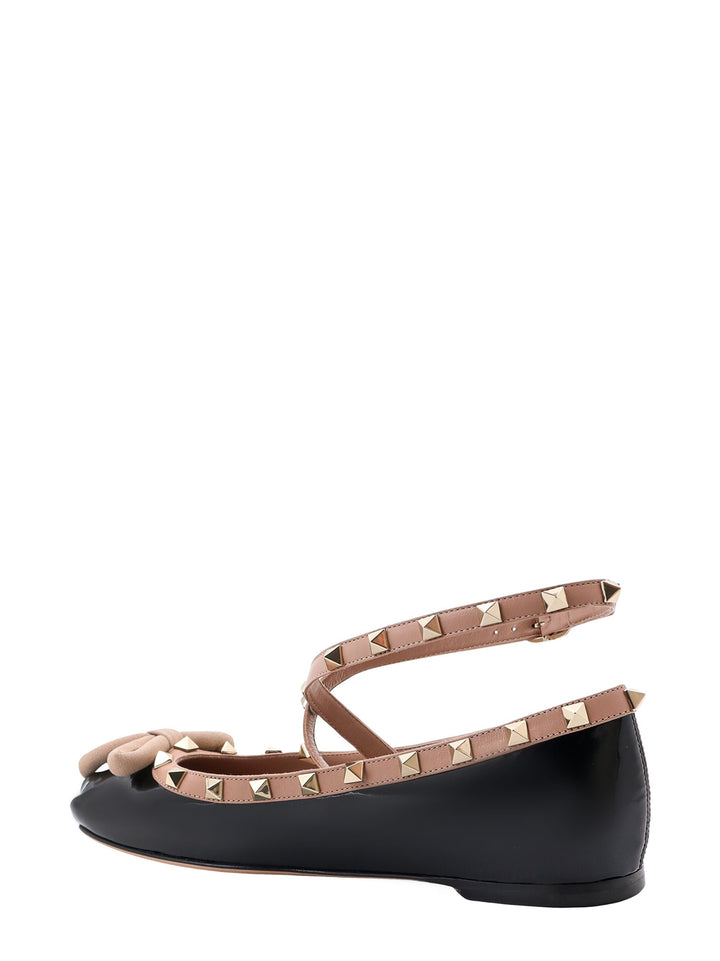 Patent leather ballerinas with iconic studs