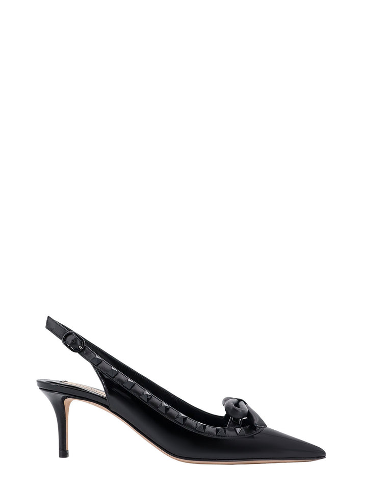 Patent leather slingback with iconic studs