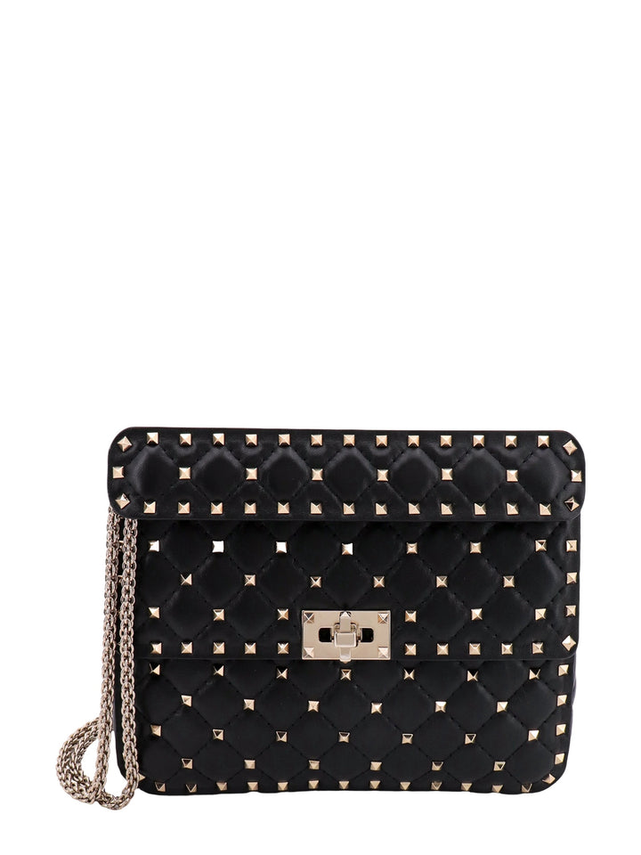 Matelassé leather shoulder bag with iconic studs