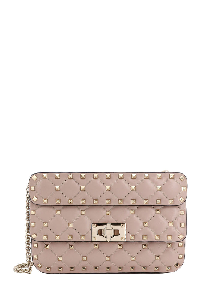 Leather shoulder bag with iconic studs