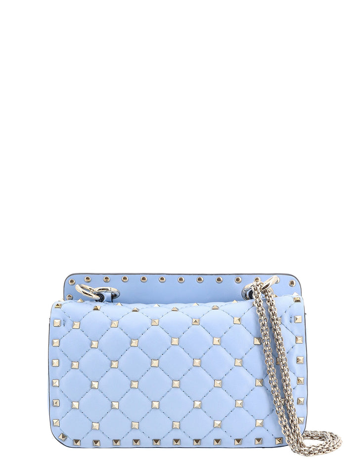 Leather shoulder bag with iconic studs