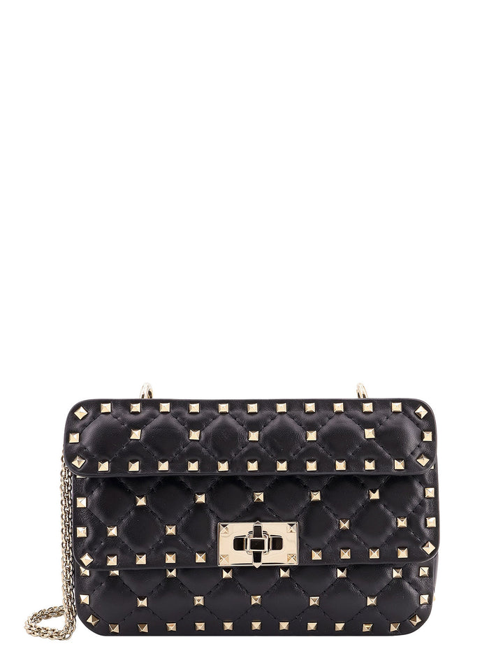 Leather shoulder bag with iconic studs