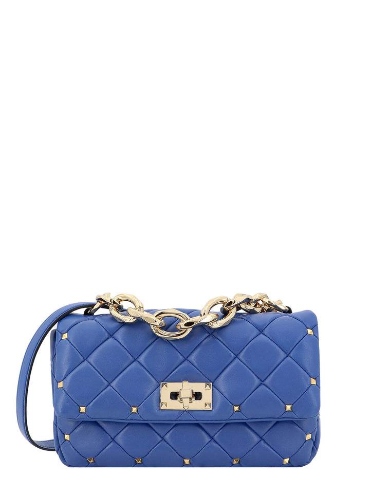 Matelassé leather shoulder bag with iconic studs