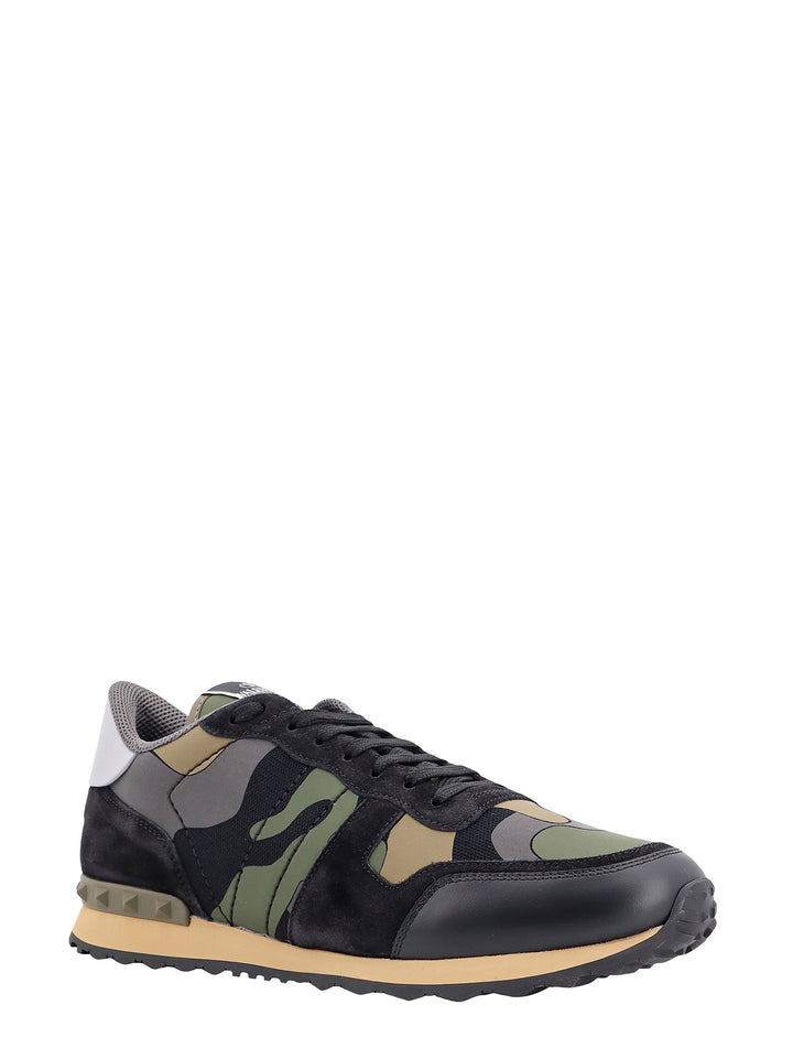 Leather and suede sneakers with camouflage print