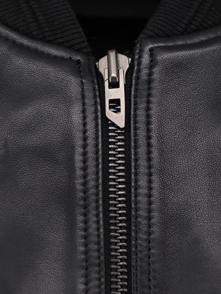 Padded leather jacket with ribbed profiles