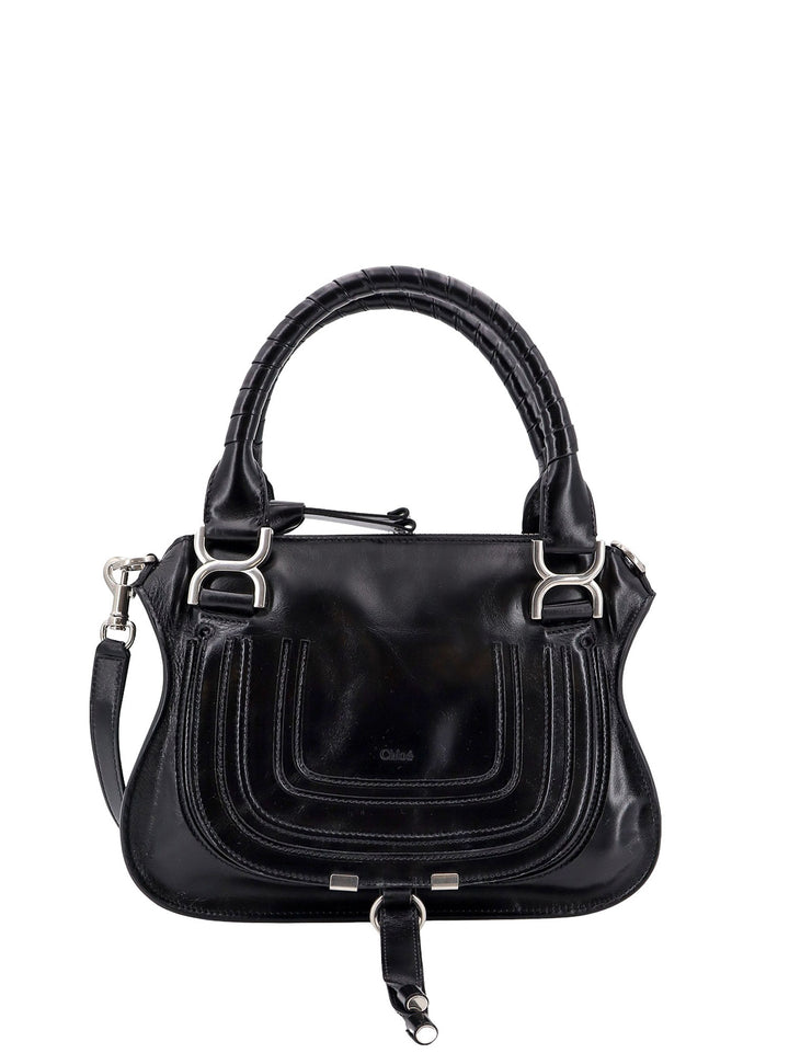 Patent leather shoulder bag with engraved logo