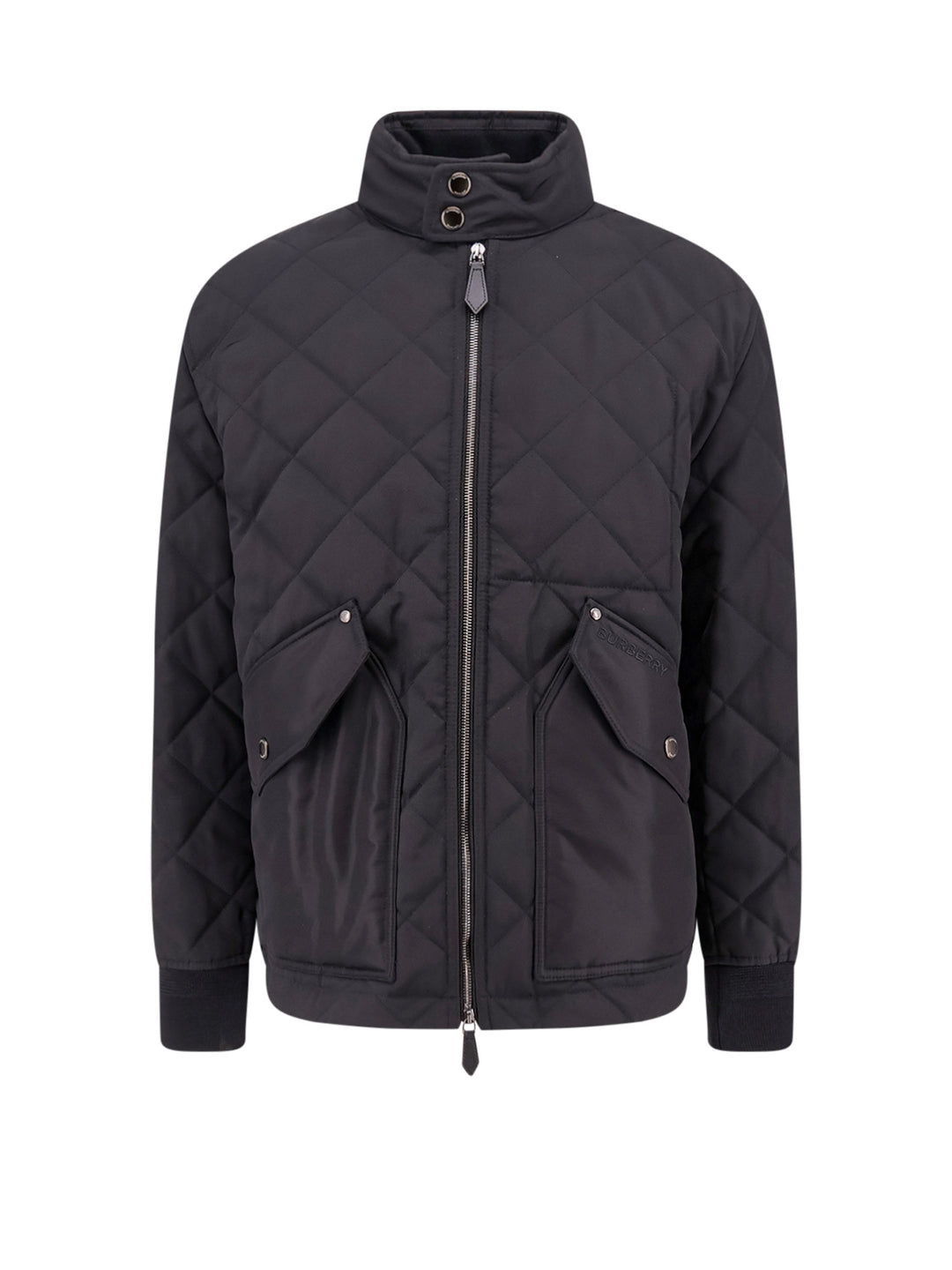 Padded and quilted nylon jacket with check lining