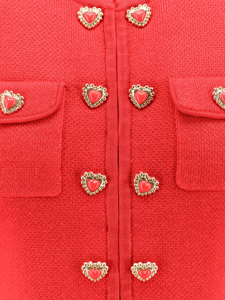 Cardigan with shoulder pads and heart buttons