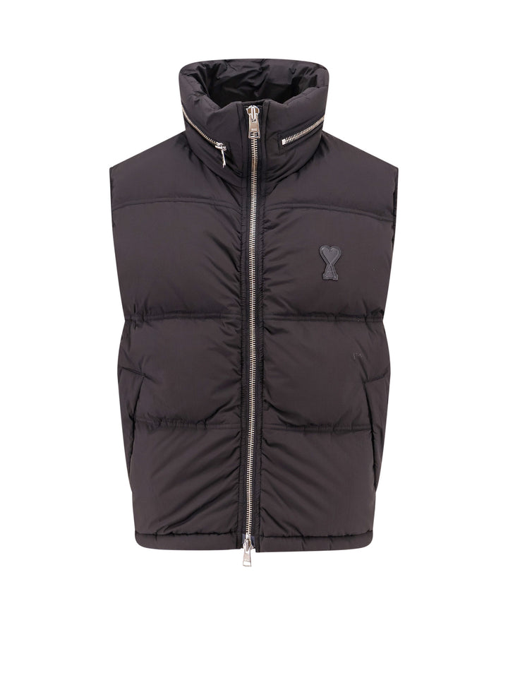 Padded and quilted sleeveless nylon jacket