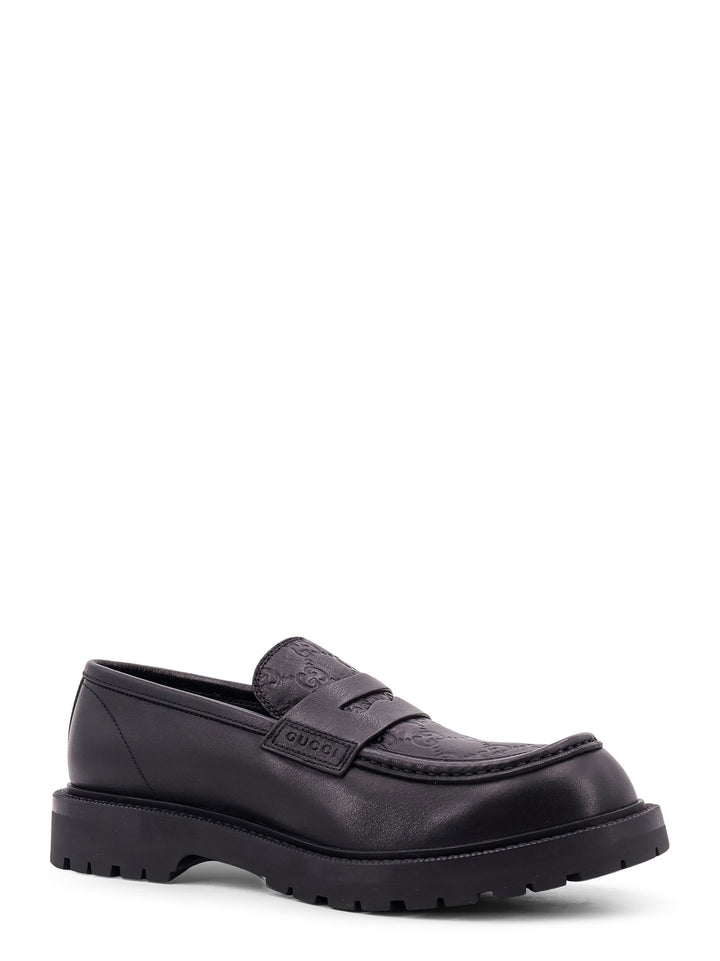 GG leather loafer, with rounded toe and Web detail on the back