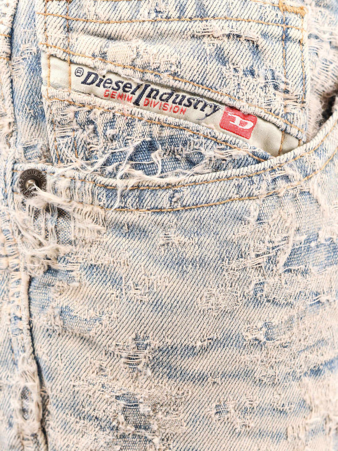 Distressed denim jeans