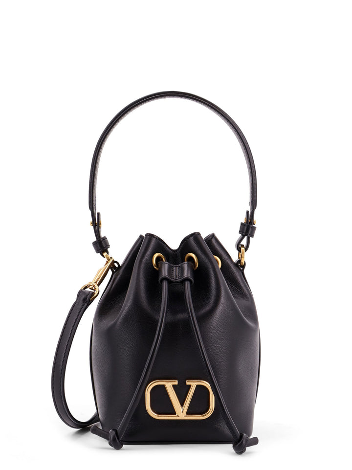 Leather bucket bag with metal logo detail on the front