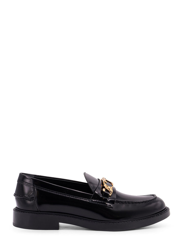 Leathe loafer with toe-cap, T Chain metal detail and rubber sole with iconic Gomminos detail