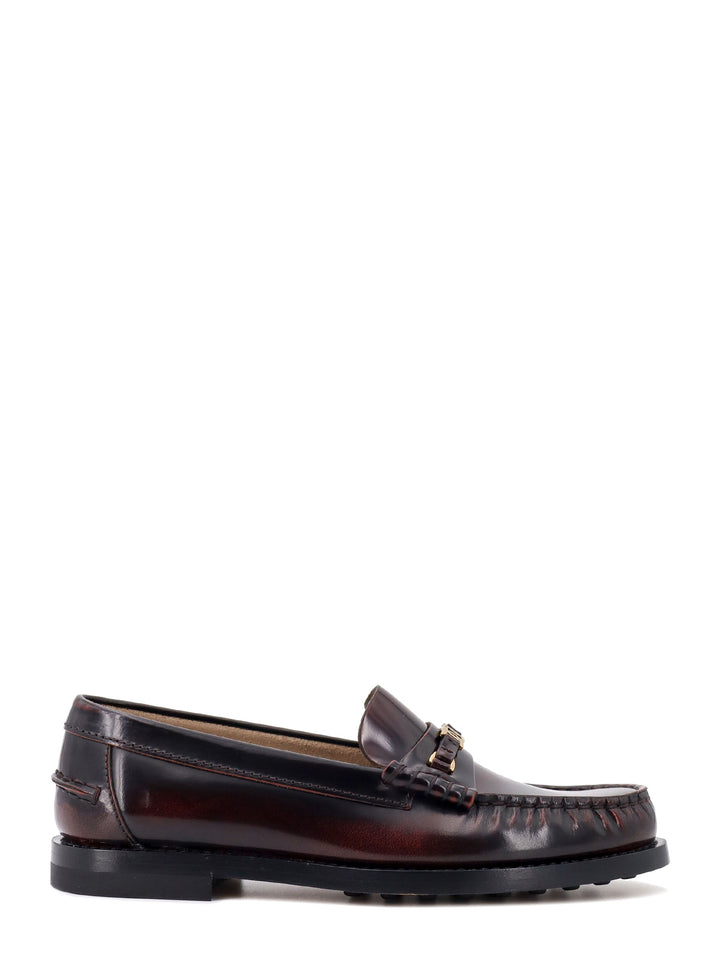 Patent leather loafer with vintage effect