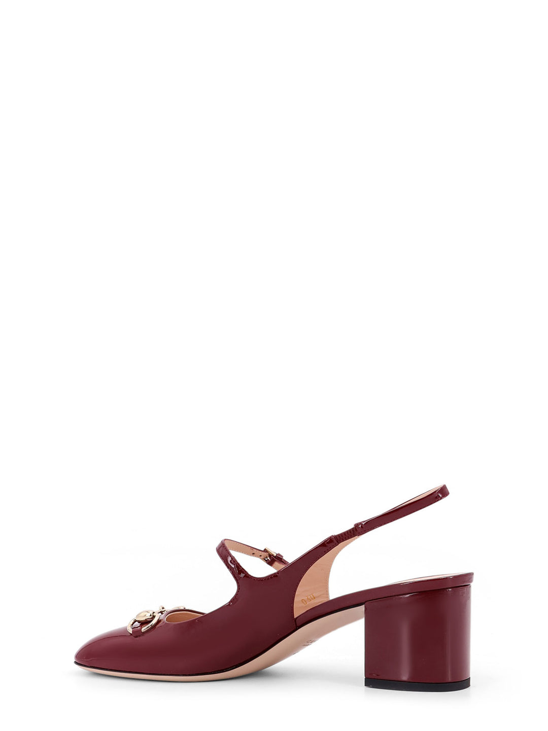 Patent leather décolleté with Iconic metal Horsebit, double strap and covered heel