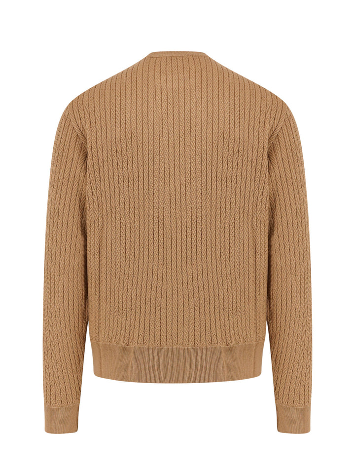 Wool blend sweater with embossed processing