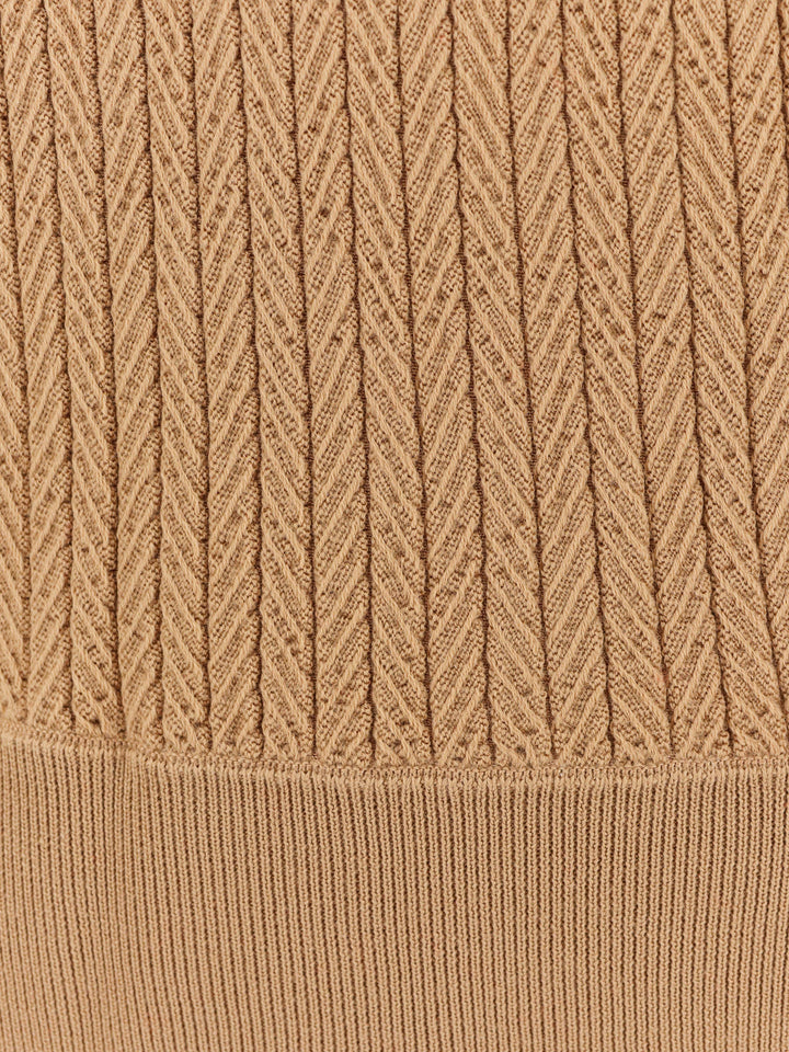 Wool blend sweater with embossed processing