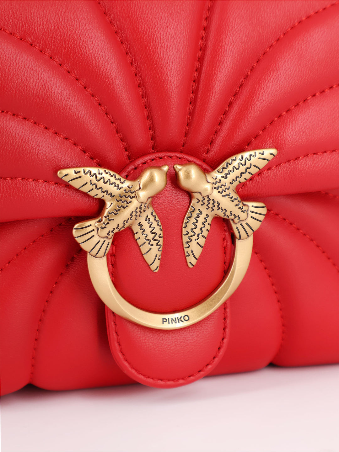 Matelassé leather shoulder bag with iconic Love Birds buckle