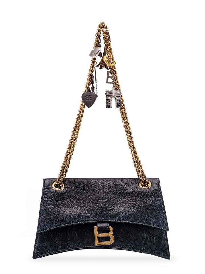 Leather shoulder bag with dirty effect and iconic metal logo