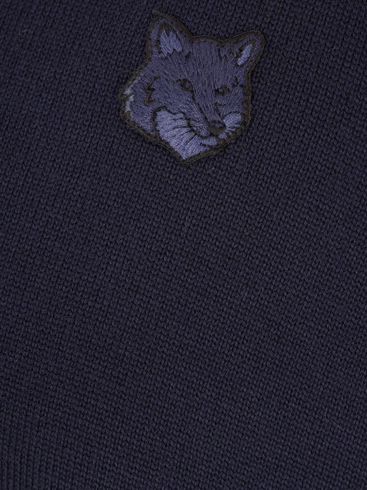 Wool cardigan with iconic embroidered logo on the front