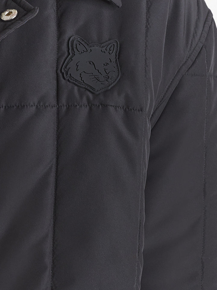 Quilted technical material jacket with rubber Foxy patch