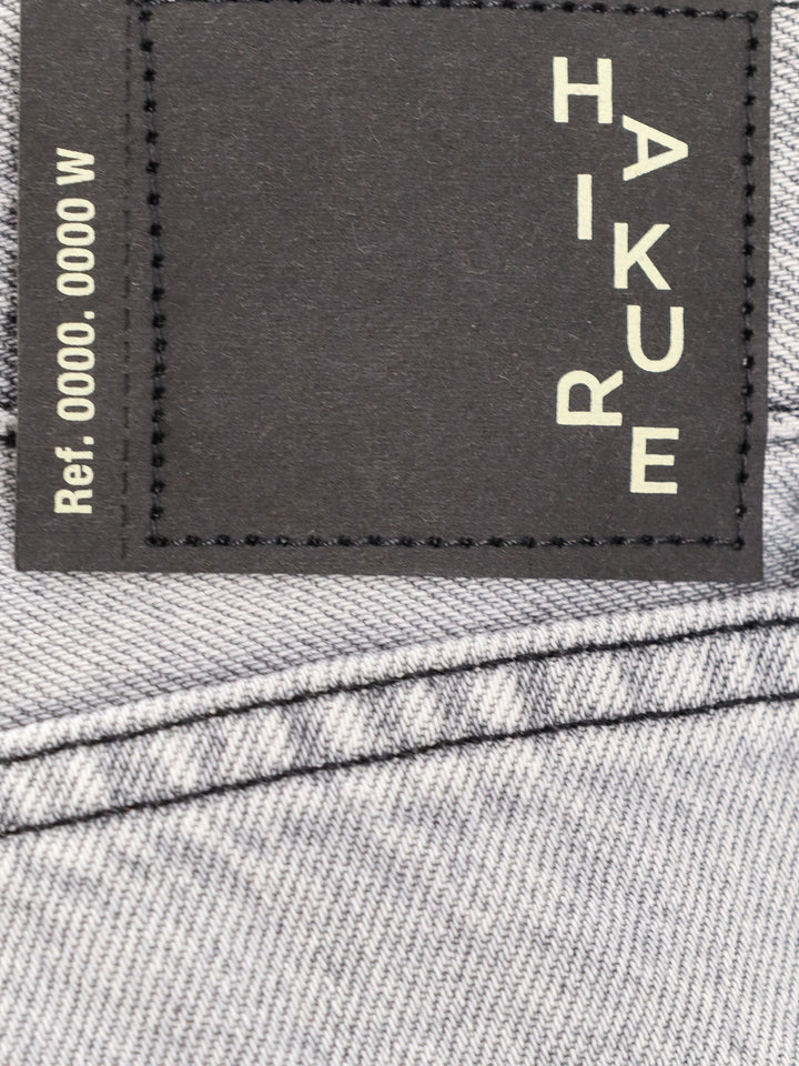 Grey denim trouser with logo tag