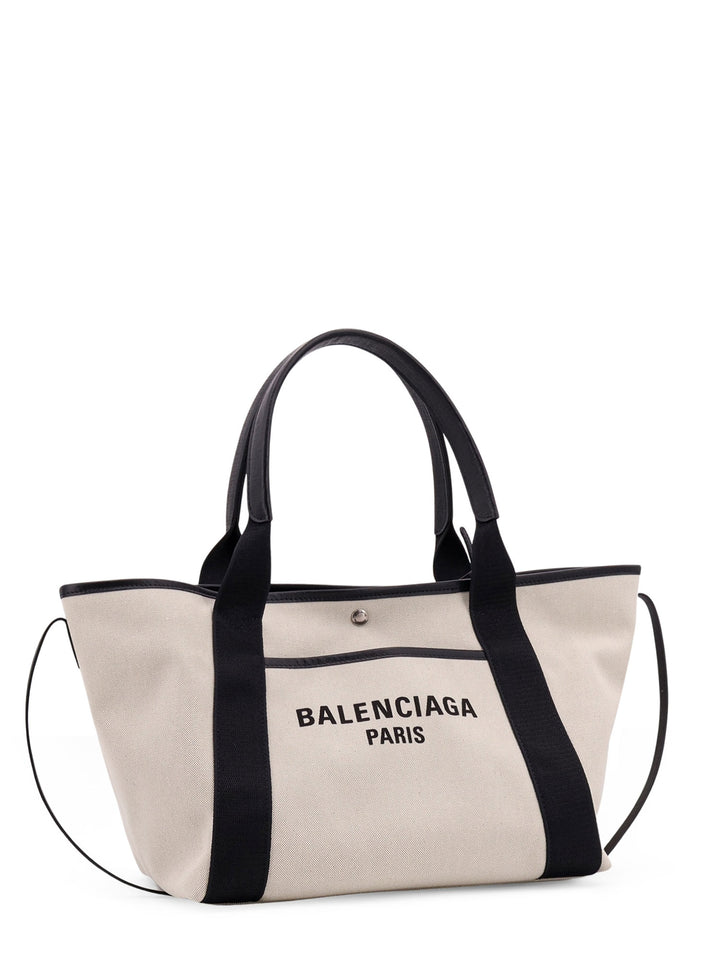 Natural cotton shoulder bag with leather profiles and logo on the front