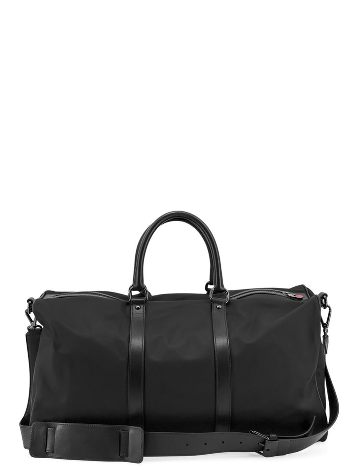 Nylon duffel bag with leather inserts