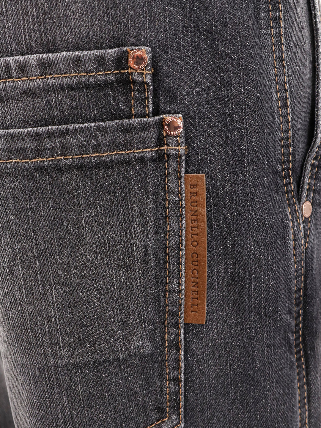 Black denim trouser with leather logo tag