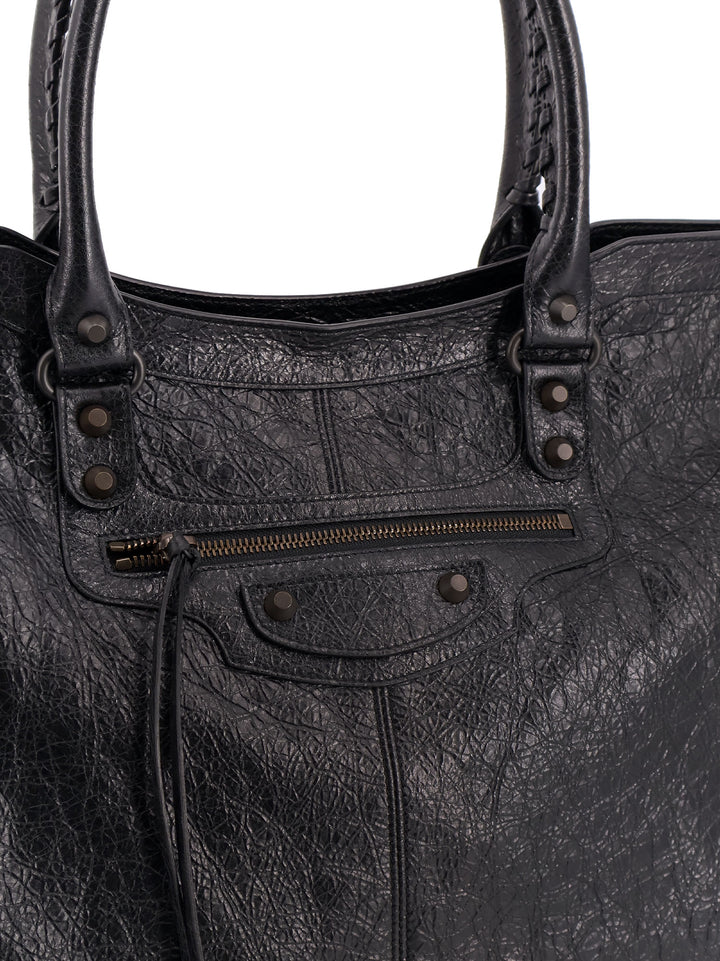 Le City leather handbag with zip pocket detail on the front