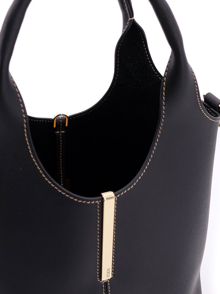 Leather handbag with metal detail on the front