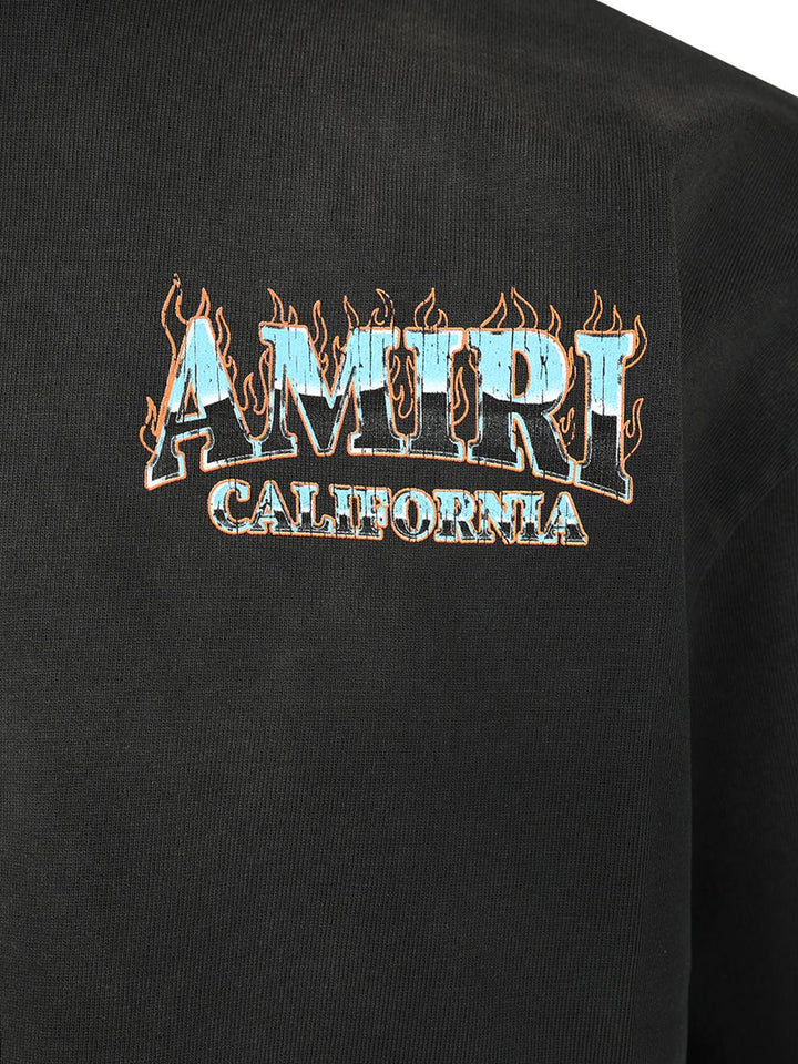 Amiri Amiri Sunny Place Oversized T-Shirt - Black | db866064e9dbc9c3cdcf473eb2c58c465cb31885