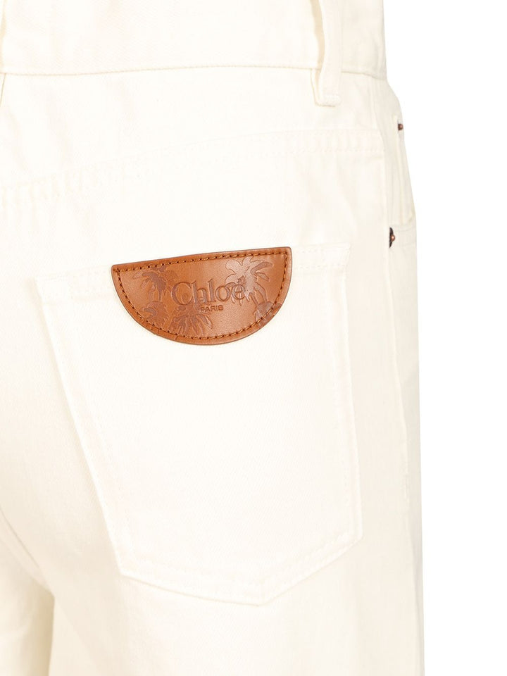 Chloe' Wide-Leg Jeans - White | d79cd50e4546a90e45348e0312fc8479b38bbae1