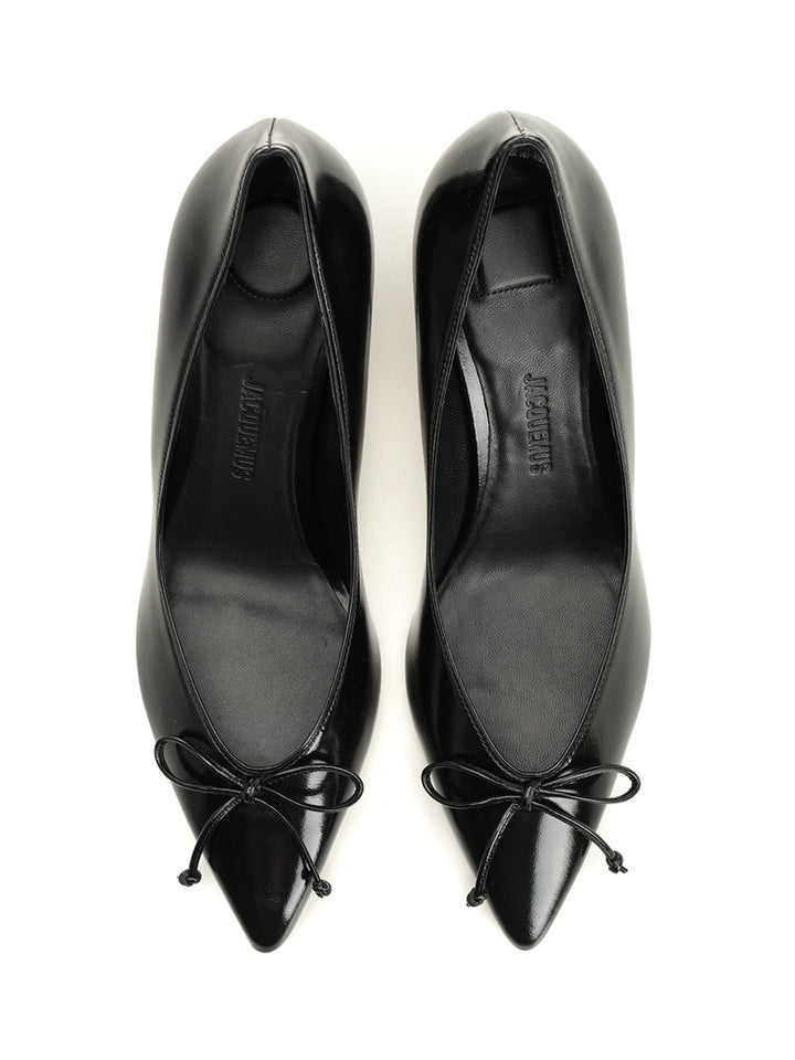 Jacquemus Tourni Décolleté Pumps - Black | 81d6e1ee617e9b7e8b24456c5bc21f8ee62da60c