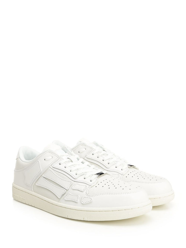 Amiri Skel Top Low Sneakers - White | f5f0c6f7263e1fef9fbc87ce708457568fb44c83