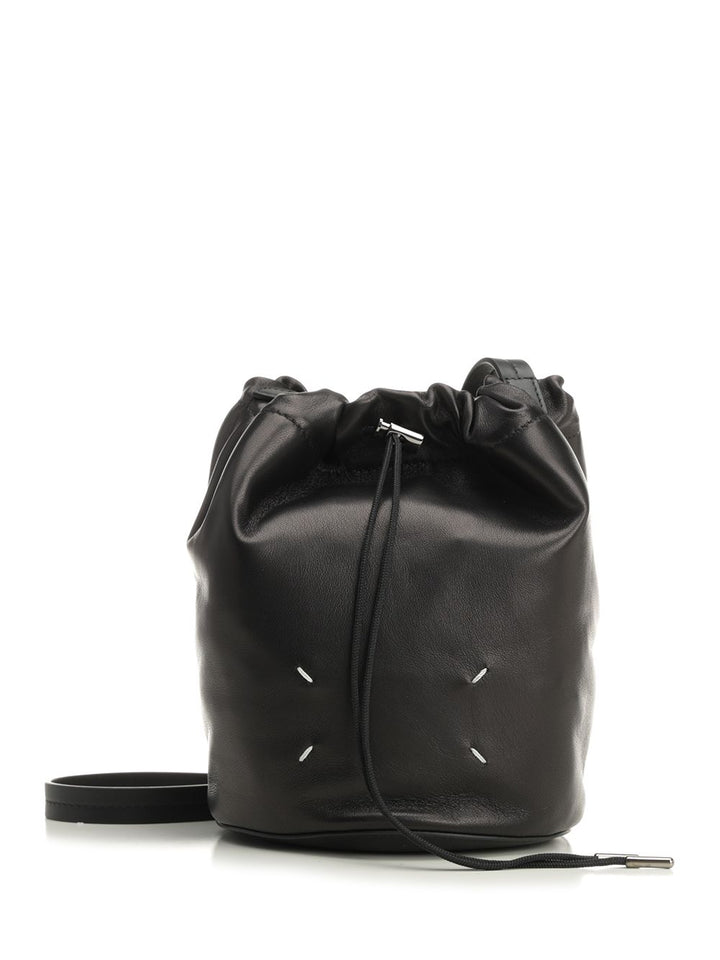Maison Margiela Drawstring Pouch Bag Crossbody Bags - Black | b7d8468eb38284141d495a008bb6a8ceac656f34