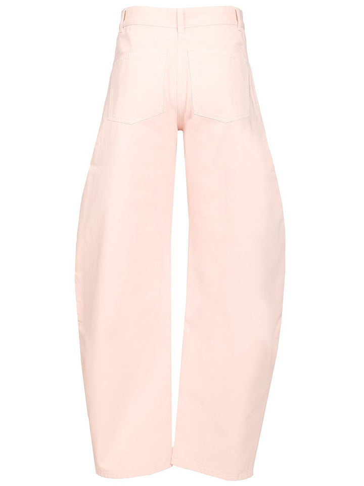 AlaÏA Curved Dyed Denim Jeans - Rose | 50b23f9e55ea3339460a665f30327cbb758ffd81