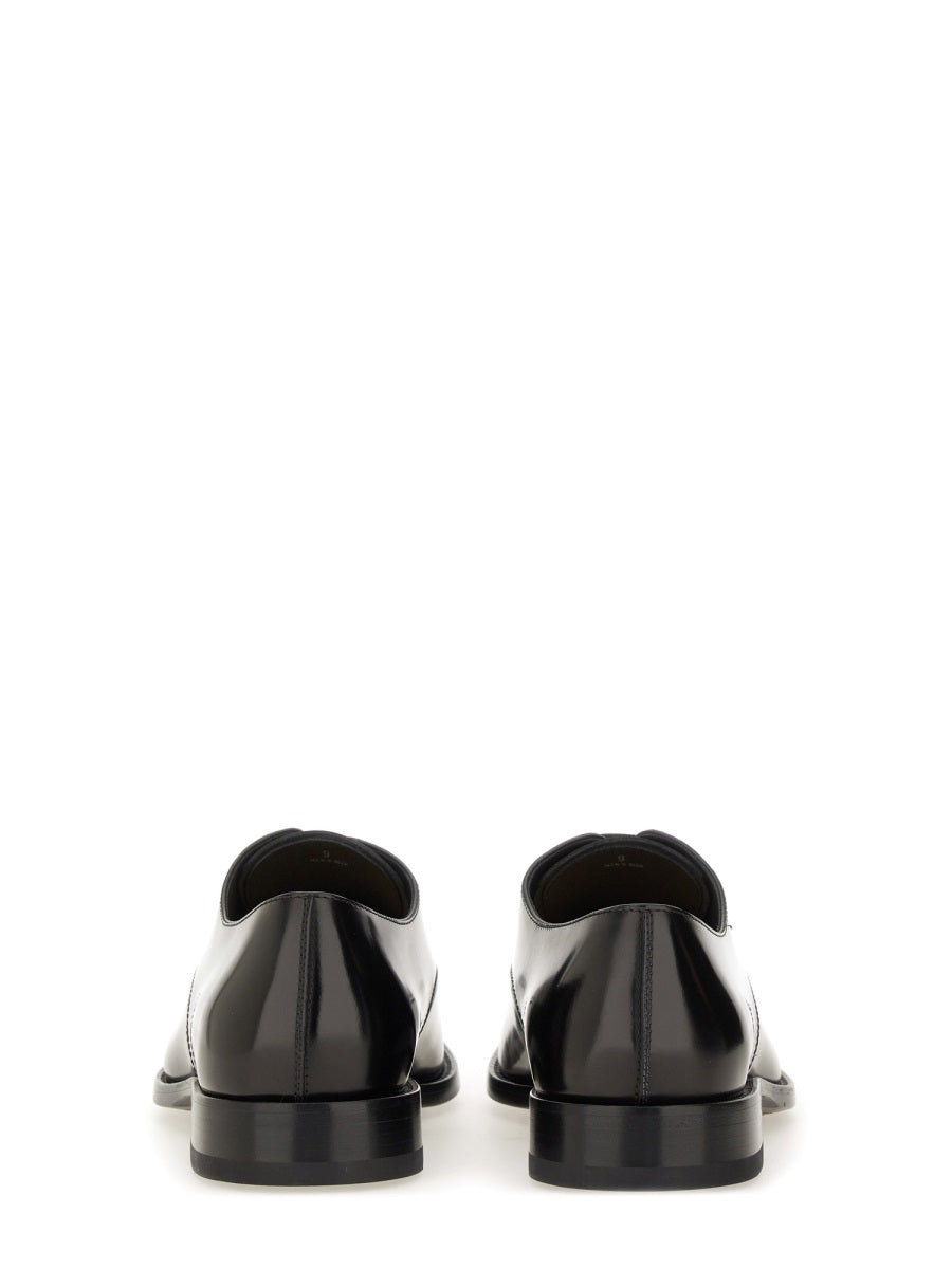 Tod's Flat Shoes - Black | Wanan Luxury