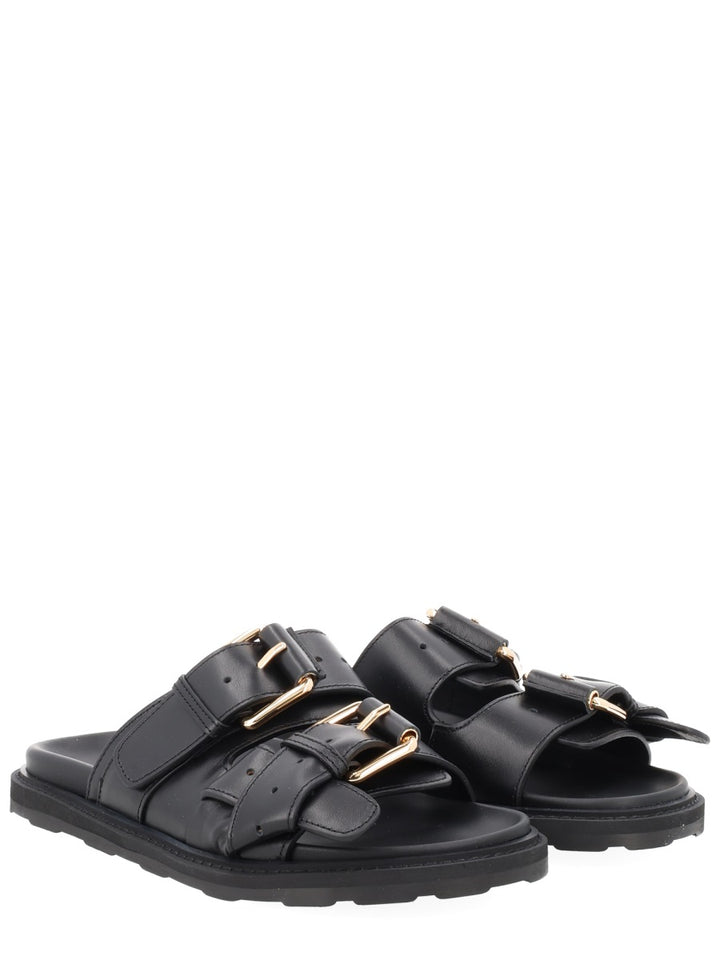 Moschino Sandals - Black | 7187548a06a84230ba0d899dc6c2e59da418a130